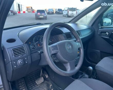 Серый Опель Мерива, объемом двигателя 1.8 л и пробегом 221 тыс. км за 5590 $, фото 17 на Automoto.ua