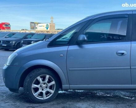 Серый Опель Мерива, объемом двигателя 1.8 л и пробегом 221 тыс. км за 5590 $, фото 3 на Automoto.ua