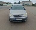 Серый Опель Мерива, объемом двигателя 1.6 л и пробегом 219 тыс. км за 4400 $, фото 2 на Automoto.ua