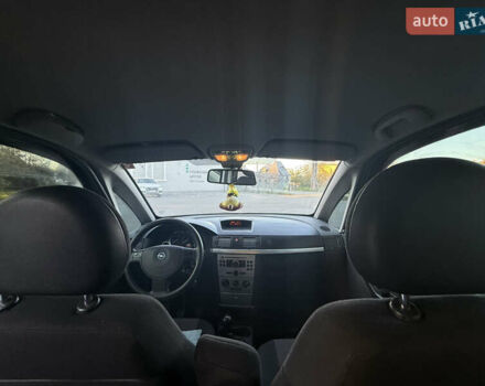 Серый Опель Мерива, объемом двигателя 1.69 л и пробегом 261 тыс. км за 3700 $, фото 5 на Automoto.ua