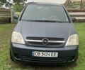 Серый Опель Мерива, объемом двигателя 1.6 л и пробегом 244 тыс. км за 3550 $, фото 1 на Automoto.ua