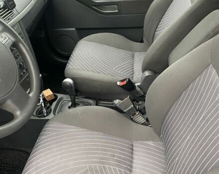 Серый Опель Мерива, объемом двигателя 1.8 л и пробегом 227 тыс. км за 4000 $, фото 7 на Automoto.ua