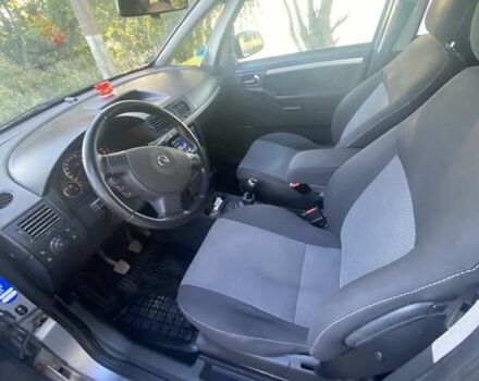 Серый Опель Мерива, объемом двигателя 1.6 л и пробегом 212 тыс. км за 5000 $, фото 4 на Automoto.ua