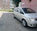Серый Опель Мерива, объемом двигателя 1.6 л и пробегом 206 тыс. км за 3900 $, фото 1 на Automoto.ua