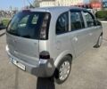 Серый Опель Мерива, объемом двигателя 1.25 л и пробегом 235 тыс. км за 4600 $, фото 4 на Automoto.ua