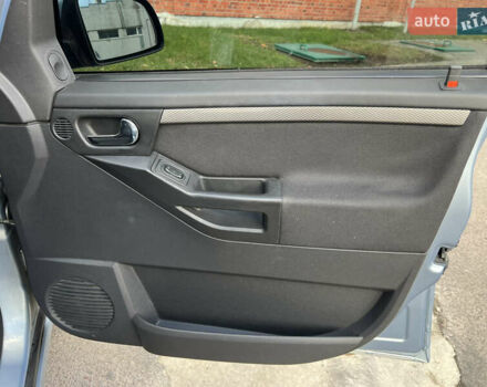 Серый Опель Мерива, объемом двигателя 1.4 л и пробегом 158 тыс. км за 4599 $, фото 39 на Automoto.ua