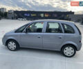 Серый Опель Мерива, объемом двигателя 1.6 л и пробегом 204 тыс. км за 4900 $, фото 1 на Automoto.ua