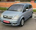 Серый Опель Мерива, объемом двигателя 1.4 л и пробегом 158 тыс. км за 4599 $, фото 5 на Automoto.ua
