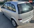 Серый Опель Мерива, объемом двигателя 1.25 л и пробегом 235 тыс. км за 4600 $, фото 2 на Automoto.ua