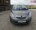 Серый Опель Мерива, объемом двигателя 1.25 л и пробегом 248 тыс. км за 6500 $, фото 1 на Automoto.ua