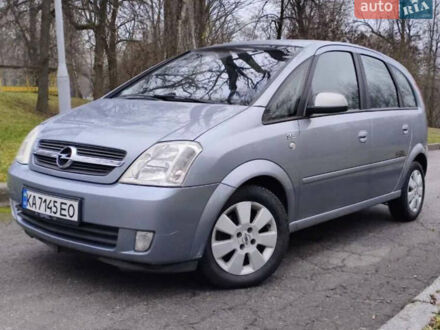 Серый Опель Мерива, объемом двигателя 1.6 л и пробегом 158 тыс. км за 4299 $, фото 1 на Automoto.ua