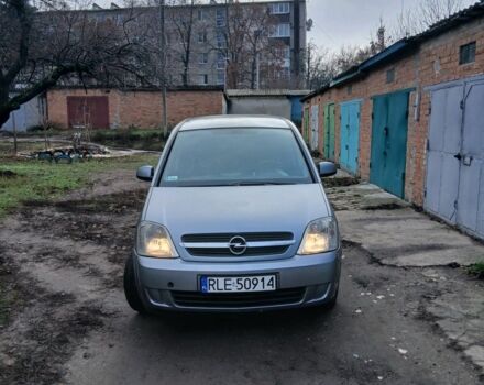 Серый Опель Мерива, объемом двигателя 1.7 л и пробегом 299 тыс. км за 1599 $, фото 1 на Automoto.ua