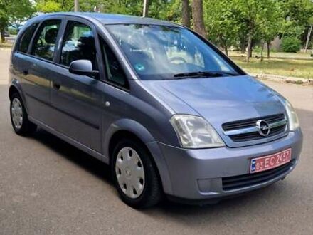 Серый Опель Мерива, объемом двигателя 1.6 л и пробегом 206 тыс. км за 4800 $, фото 1 на Automoto.ua