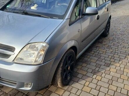 Серый Опель Мерива, объемом двигателя 1.6 л и пробегом 252 тыс. км за 3800 $, фото 1 на Automoto.ua