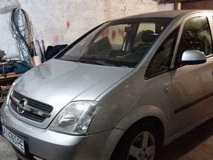 Серый Опель Мерива, объемом двигателя 1.7 л и пробегом 310 тыс. км за 3800 $, фото 1 на Automoto.ua