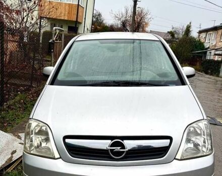 Серый Опель Мерива, объемом двигателя 1.25 л и пробегом 204 тыс. км за 4200 $, фото 1 на Automoto.ua