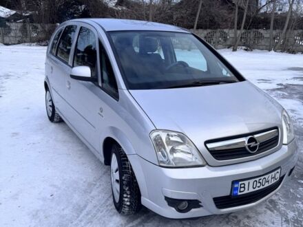 Серый Опель Мерива, объемом двигателя 1.6 л и пробегом 250 тыс. км за 4200 $, фото 1 на Automoto.ua