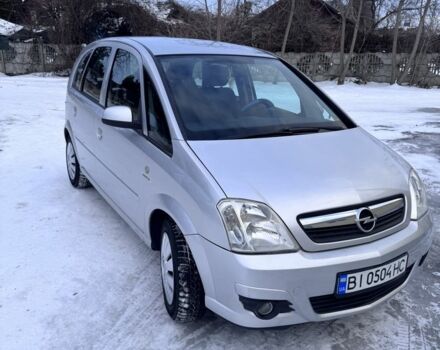 Серый Опель Мерива, объемом двигателя 1.6 л и пробегом 250 тыс. км за 4200 $, фото 1 на Automoto.ua