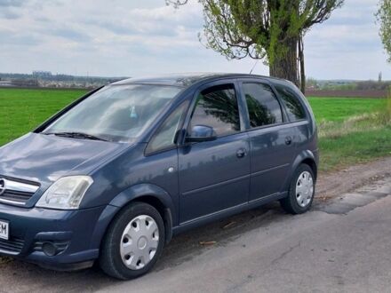 Серый Опель Мерива, объемом двигателя 1.6 л и пробегом 210 тыс. км за 4600 $, фото 1 на Automoto.ua