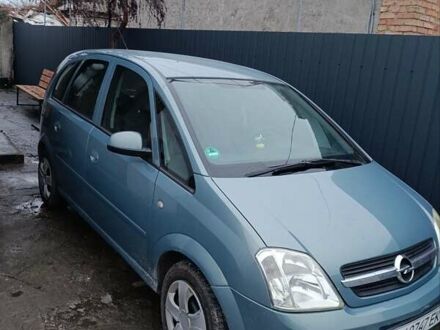 Серый Опель Мерива, объемом двигателя 1.6 л и пробегом 243 тыс. км за 4500 $, фото 1 на Automoto.ua