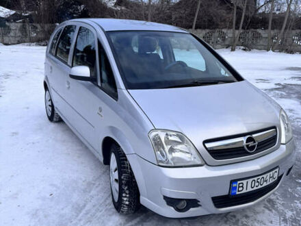 Серый Опель Мерива, объемом двигателя 1.6 л и пробегом 250 тыс. км за 4200 $, фото 1 на Automoto.ua