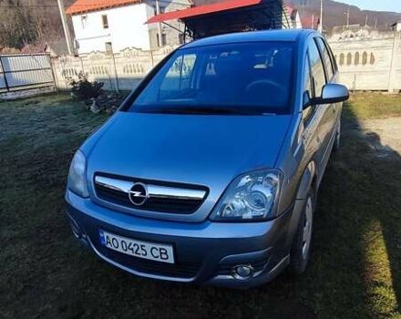 Серый Опель Мерива, объемом двигателя 1.8 л и пробегом 194 тыс. км за 4000 $, фото 1 на Automoto.ua