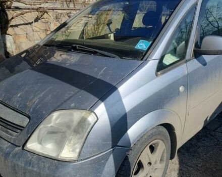 Серый Опель Мерива, объемом двигателя 1.69 л и пробегом 210 тыс. км за 3450 $, фото 1 на Automoto.ua