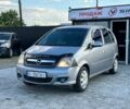 Синий Опель Мерива, объемом двигателя 1.8 л и пробегом 250 тыс. км за 3850 $, фото 1 на Automoto.ua