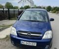 Синий Опель Мерива, объемом двигателя 1.4 л и пробегом 208 тыс. км за 3300 $, фото 2 на Automoto.ua