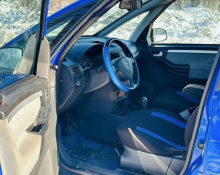 Синий Опель Мерива, объемом двигателя 1.6 л и пробегом 176 тыс. км за 2999 $, фото 4 на Automoto.ua