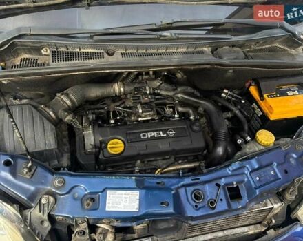 Синий Опель Мерива, объемом двигателя 1.69 л и пробегом 253 тыс. км за 3850 $, фото 14 на Automoto.ua