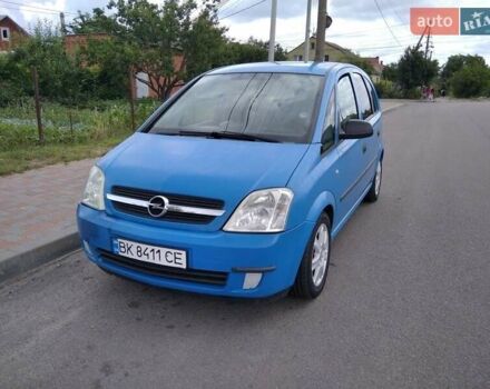 Синий Опель Мерива, объемом двигателя 1.6 л и пробегом 287 тыс. км за 4000 $, фото 2 на Automoto.ua