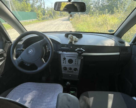 Синий Опель Мерива, объемом двигателя 1.8 л и пробегом 248 тыс. км за 4300 $, фото 5 на Automoto.ua