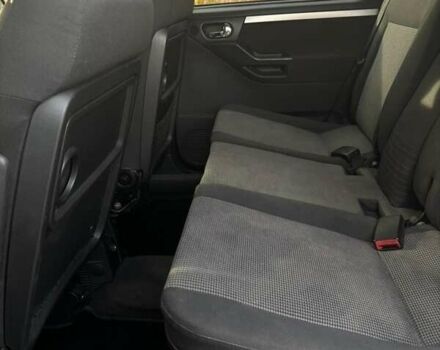 Синий Опель Мерива, объемом двигателя 1.69 л и пробегом 253 тыс. км за 3850 $, фото 22 на Automoto.ua