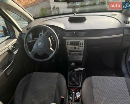 Синий Опель Мерива, объемом двигателя 1.69 л и пробегом 253 тыс. км за 3850 $, фото 16 на Automoto.ua