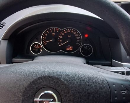 Синий Опель Мерива, объемом двигателя 1.6 л и пробегом 185 тыс. км за 4099 $, фото 13 на Automoto.ua