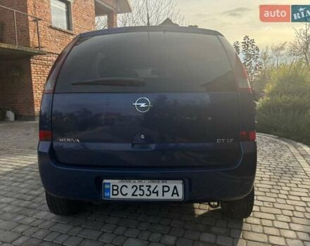 Синий Опель Мерива, объемом двигателя 1.69 л и пробегом 253 тыс. км за 3850 $, фото 7 на Automoto.ua