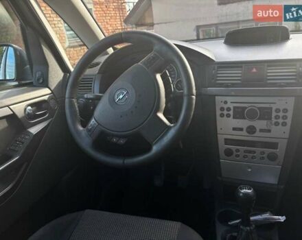 Синий Опель Мерива, объемом двигателя 1.69 л и пробегом 253 тыс. км за 3850 $, фото 17 на Automoto.ua