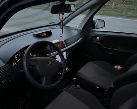 Синий Опель Мерива, объемом двигателя 1.7 л и пробегом 269 тыс. км за 1750 $, фото 5 на Automoto.ua