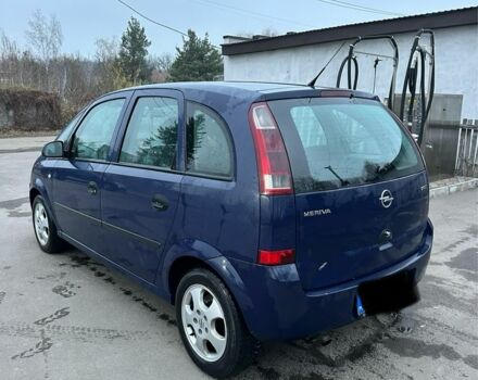 Синий Опель Мерива, объемом двигателя 1.7 л и пробегом 269 тыс. км за 1750 $, фото 4 на Automoto.ua