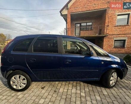 Синий Опель Мерива, объемом двигателя 1.69 л и пробегом 253 тыс. км за 3850 $, фото 5 на Automoto.ua