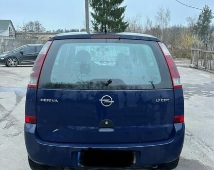 Синий Опель Мерива, объемом двигателя 1.7 л и пробегом 269 тыс. км за 1750 $, фото 3 на Automoto.ua