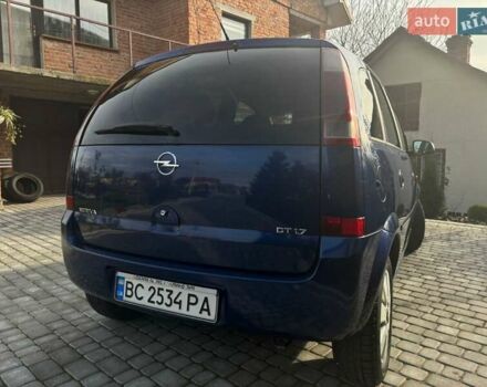 Синий Опель Мерива, объемом двигателя 1.69 л и пробегом 253 тыс. км за 3850 $, фото 8 на Automoto.ua