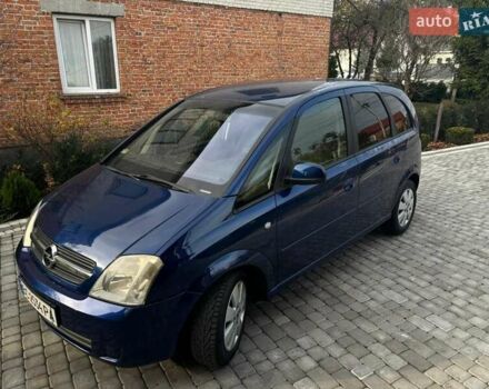 Синий Опель Мерива, объемом двигателя 1.69 л и пробегом 253 тыс. км за 3850 $, фото 2 на Automoto.ua