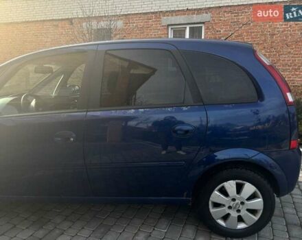 Синий Опель Мерива, объемом двигателя 1.69 л и пробегом 253 тыс. км за 3850 $, фото 6 на Automoto.ua
