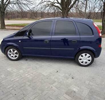 Синий Опель Мерива, объемом двигателя 1.6 л и пробегом 188 тыс. км за 4000 $, фото 6 на Automoto.ua