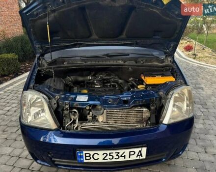 Синий Опель Мерива, объемом двигателя 1.69 л и пробегом 253 тыс. км за 3850 $, фото 15 на Automoto.ua