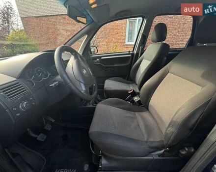 Синий Опель Мерива, объемом двигателя 1.69 л и пробегом 253 тыс. км за 3850 $, фото 20 на Automoto.ua