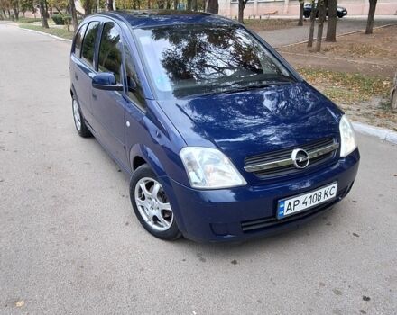 Синий Опель Мерива, объемом двигателя 1.6 л и пробегом 185 тыс. км за 4099 $, фото 1 на Automoto.ua