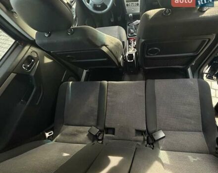 Синий Опель Мерива, объемом двигателя 1.69 л и пробегом 253 тыс. км за 3850 $, фото 18 на Automoto.ua